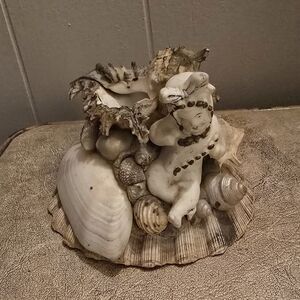 Whimsical Seashell Cherub Sculpture
